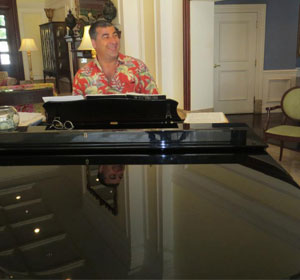 Dr Pourgol playing Piano in Bermuda