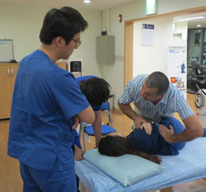 Dr Pourgol teaching manual osteopathy at NAO campus in South Korea