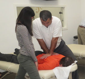 Dr Pourgol teaching osteopathy